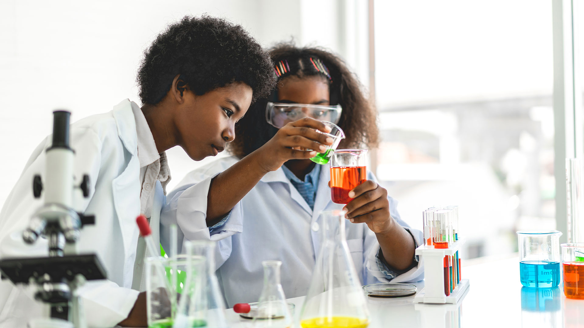 Young students conducting science experiment